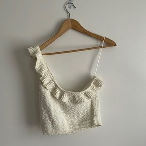 One shoulder cream crop top with ruffles